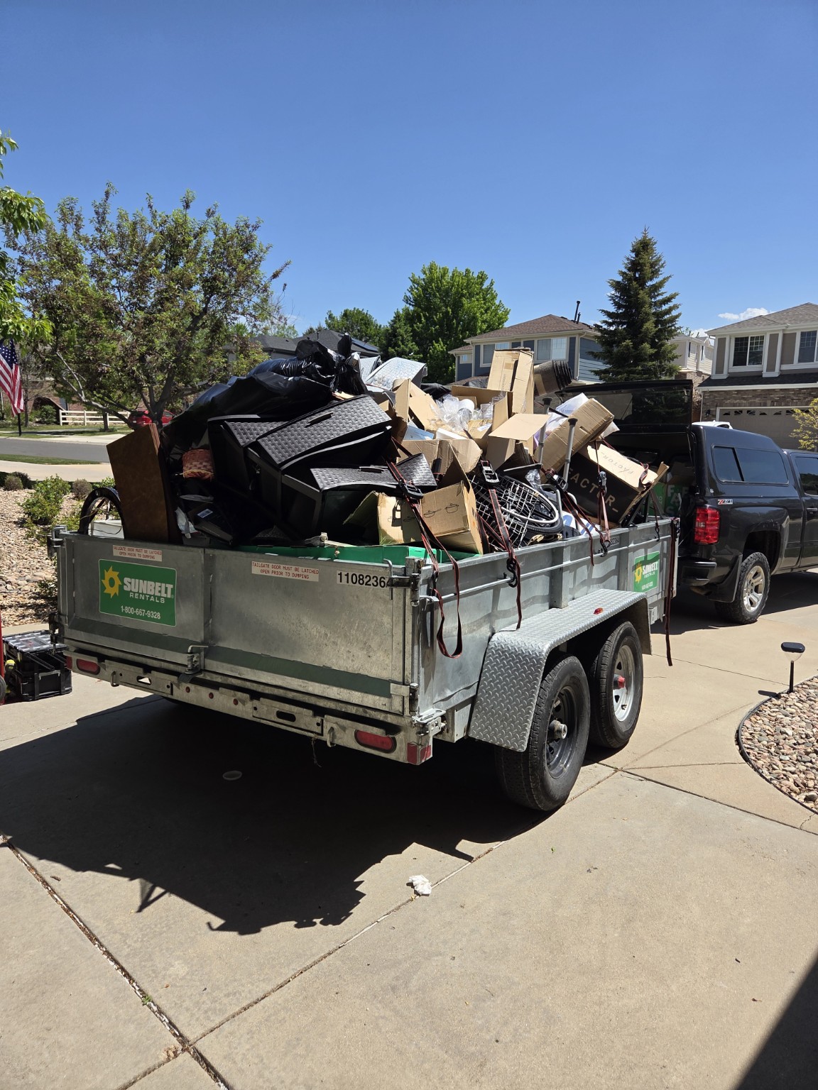 Trailer loaded with household junk